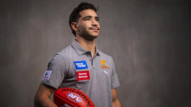 Toby Bedford poses for a photograph after he moved from the Melbourne Demons to the GWS Giants (Photo by Daniel Pockett/Getty Images)