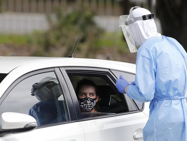 BRISBANE, AUSTRALIA - NewsWire Photos - JANUARY 5TH 2022:  Members of the public and pathology staff pictured at the Ashgrove Baptist Church Covid-19 testing site. Picture: NCA NewsWire / Josh Woning