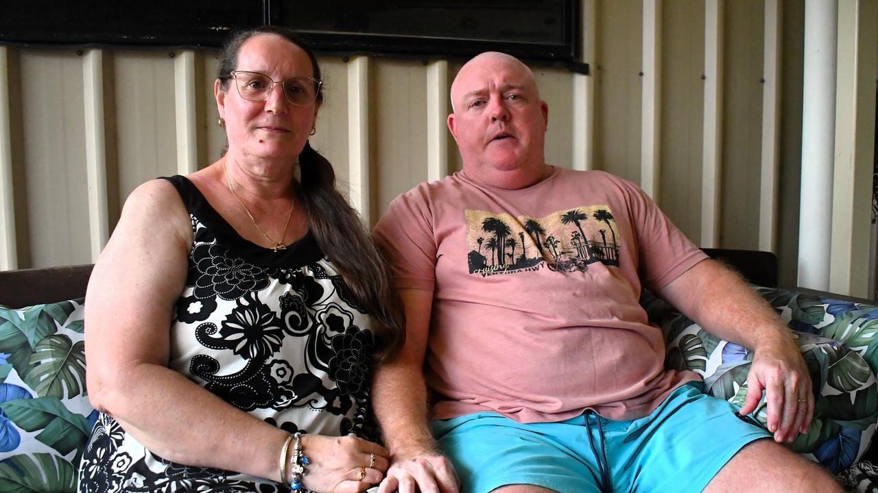 John “Benny” Benstead and wife Racheal at their home in Kirwan, Townsville. Mrs Benstead said “it kills me” to see her husband battling Reactive Airways Dysfunction Syndrome after he was allegedly covered in a load of fly ash in an alleged industrial accident driving a loader for Holcim in Bohle, Townsville in early 2023. Picture: Cameron Bates