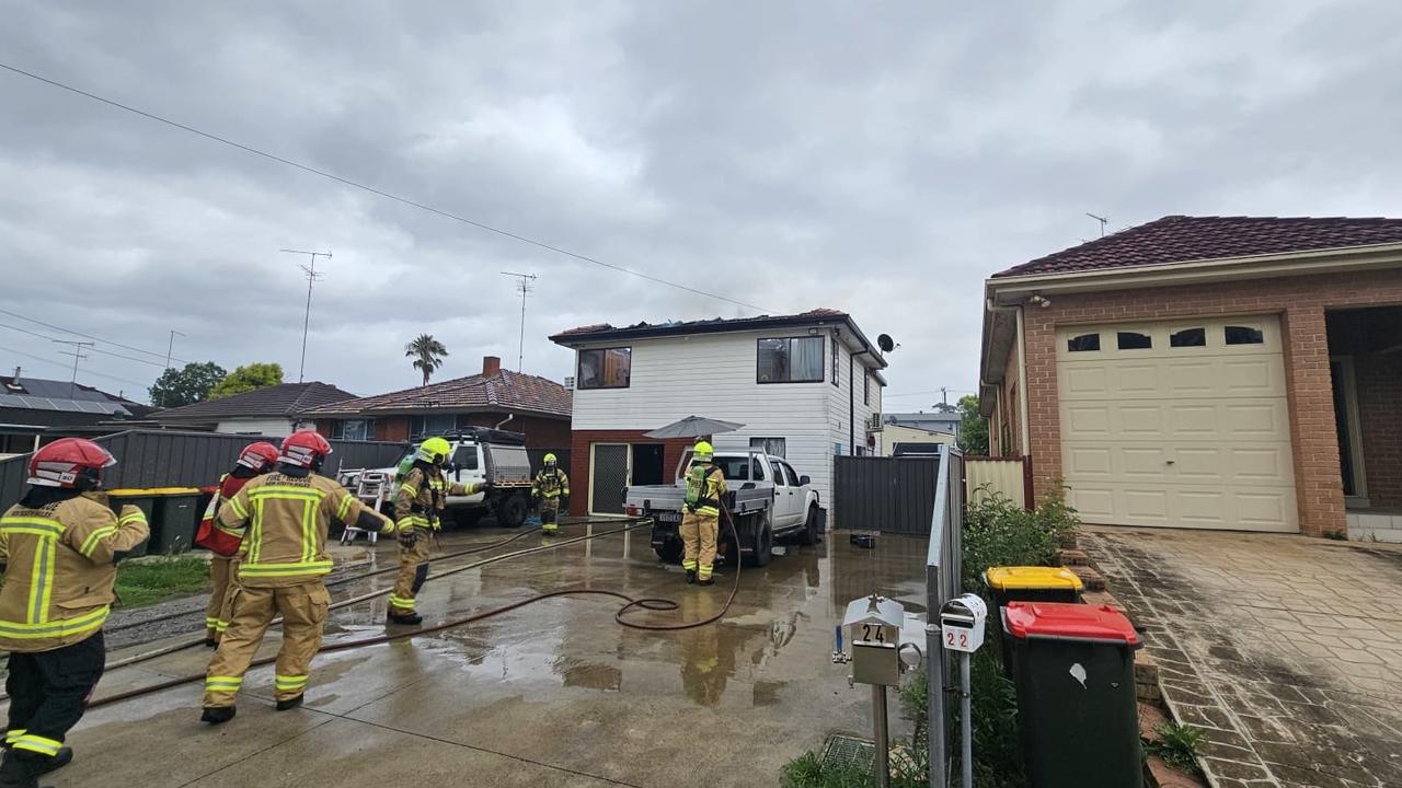 Roof buckles in western Sydney house fire