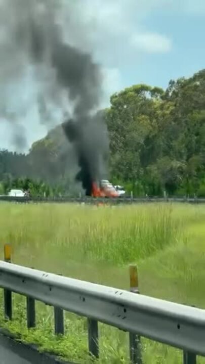 Car engulfed by fire on Bruce Highway