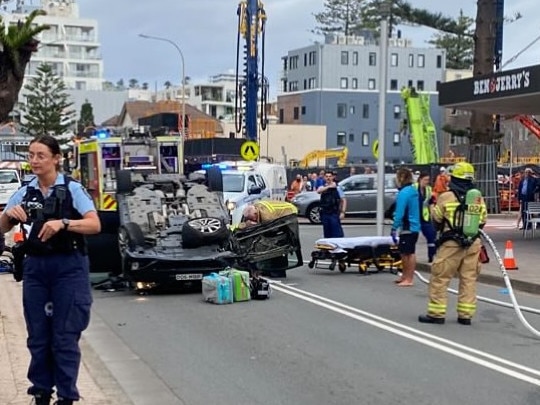 Roads along Manly Beach have been closed after a driver allegedly hit a number of vehicles before flipping onto Manly Beach.A NSW Ambulance spokesman confirmed a man in his 70s was involved in a single vehicle accident, he suffered minor injuries and was transported to Royal North Shore Hospital. Picture: Manly Observer