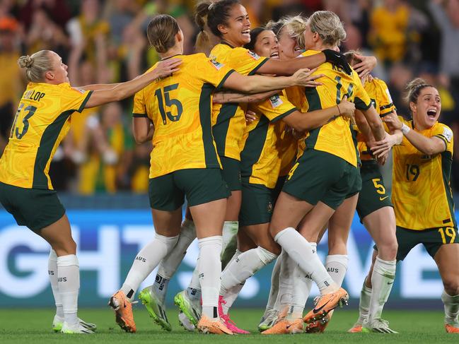 Australia players celebrate their victory through the penalty shoot out against France. Picture: Chris Hyde – FIFA/FIFA via Getty Images