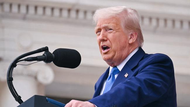 US President Donald Trump delivers remarks at the National Veterans Day Observance at the Memorial Amphitheatre in Arlington National Cemetery in Arlington, Virginia, on May 26, 2025. (Photo by SAUL LOEB / AFP)