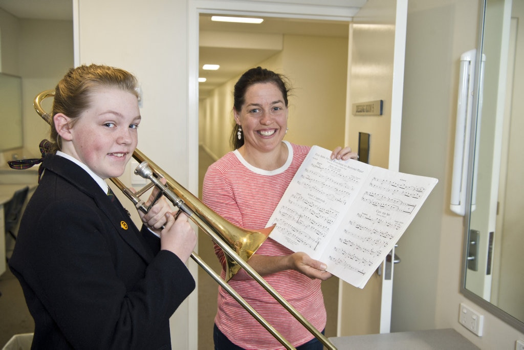 Amelia Webster gets help from mum Elisa Webster before her first performance in the 73rd City of Toowoomba Eisteddfod, Monday, July 30, 2018. Picture: Kevin Farmer