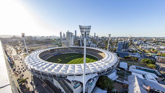 File photograph of the Gabba Cricket Ground with East Brisbane State School to the right.