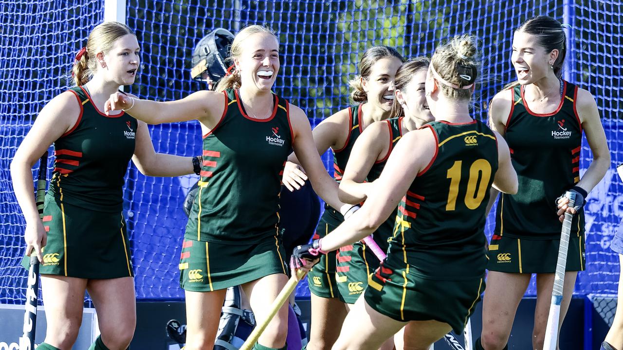 Rising Tasmanian hockey stars make history