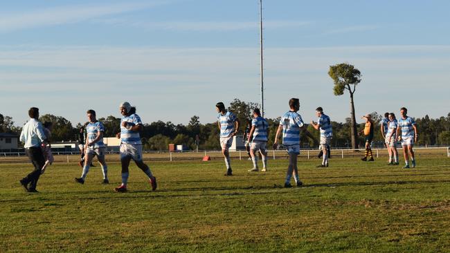 Spectators cheer on as they watch the A Grade Roma vs Condamine match at the Roma Rugby Races at Bassett Park. Picture: Chloe Cufflin.