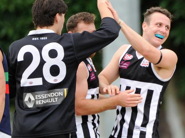 (From left) Jack Newman, Ned Wilson and Billy Hansen celebrate a Moonee Valley goal in the EDFL. Picture: Jamie Morey