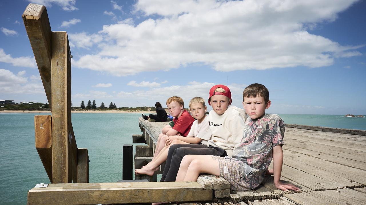 Locals, Oliver Turner, 6, Riley Gray, 8, Khai Tinwell, 9, and Mason Turner, 7, in Port Elliot, where the Horseshoe Bay pontoon has been removed. Picture: Matt Loxton