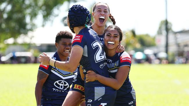 NQ Cowboys players celebrate with teammate Tahlulah Tillett after she scores a try in the NRLW pre season match between the North Queensland Cowboys women and the Gold Coast Titans women's team, held at Alley Park, Gordonvale. Picture: Brendan Radke