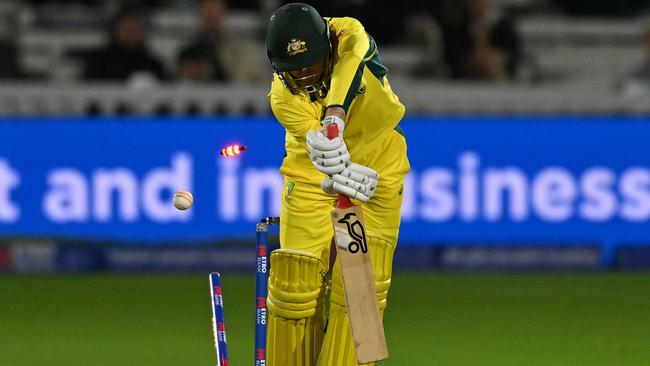 Bails fly as Australia's Marnus Labuschagne loses his wicket. Photo by Glyn KIRK / AFP