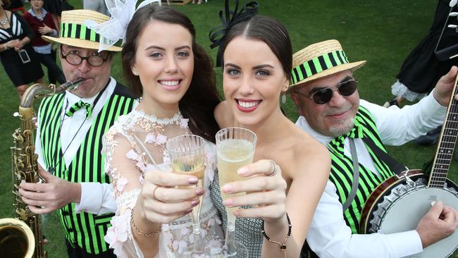 Geelong twins Taylah and Alannah Matchett with Jason Chalmers and Robert Severini of the Dixie Dukes at the Geelong Cup. Picture: Glenn Ferguson