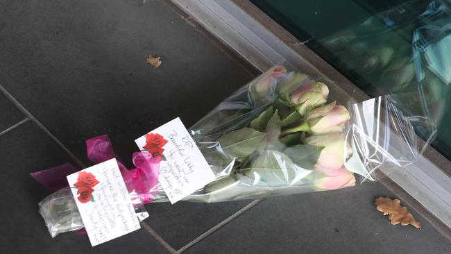 Flowers tributes at the Olivia Newton- John cancer and Wellness Centre. Picture: David Crosling