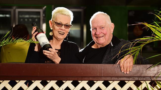 Victoria Park Hotel publicans Robyn Sexton and Frank Sexton with a bottle of wine that survived the fire