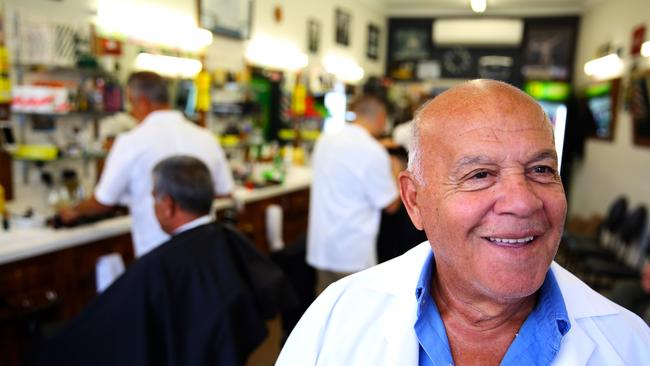 Kamil Kandakji, 79, at started Bankstown Barber Salon in 1976. Picture: Angelo Velardo