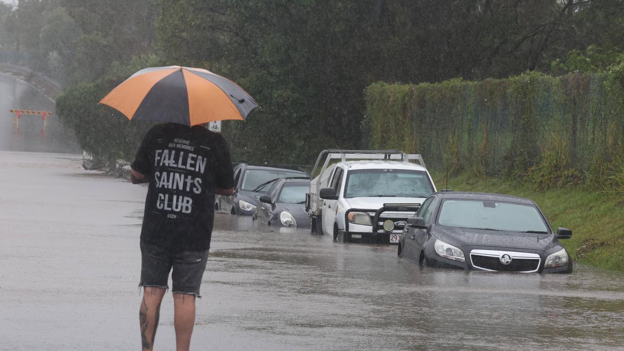 Flooding at Siganto Drive in Helensvale on Sunday. Picture: Glenn Hampson.