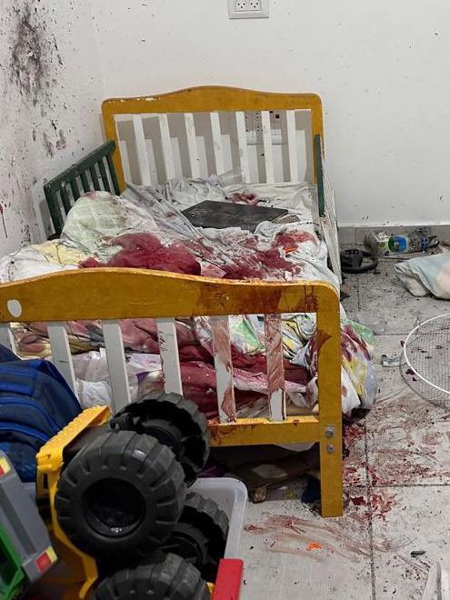 Israel's Director of the Digital Diplomacy Bureau David Saranga posted graphic pictures to social media showing the bloody remains of what appears to be a child's bedroom, including a plastic tub full of children's toys.