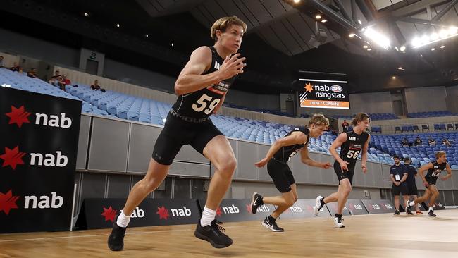 Dylan Stephens, second from left, during the Yo-Yo endurance test at the AFL Draft Combine. Picture: Dylan Burns/AFL Photos