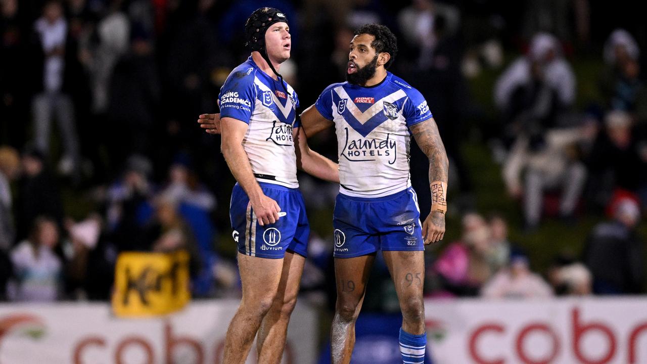 Josh Addo-Carr of the Bulldogs (right) consoles Matt Burton following their loss in the Round 13 NRL match between the Penrith Panthers and the Canterbury-Bankstown Bulldogs at Bluebet Stadium in Sydney, Friday, June 3, 2022. (AAP Image/Dan Himbrechts) NO ARCHIVING, EDITORIAL USE ONLY