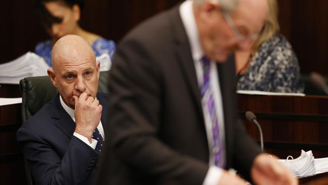 Premier Peter Gutwein looks on as Minister for Police, Fire and Emergency Management Mark Shelton answers a question from the Labor party during question time in State Parliament. Picture: Zak Simmonds