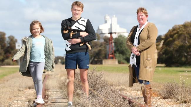 Murrayville Community College teacher Sonya Inglis with Year 10 student Lenard and his sister Bernice, Year 2. Picture: Tait Schmaal