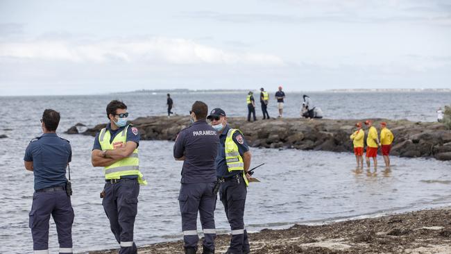 Paramedics on Altona beach. Picture: David Geraghty