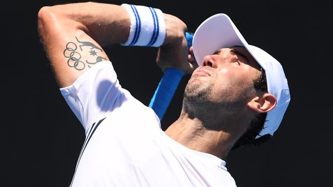 Jordan Thompson of Australia in action against Nicolas Kicker of Argentina during round one, on day two of the Australian Open tennis tournament, in Melbourne, Tuesday, January 16, 2018. (AAP Image/Julian Smith) NO ARCHIVING, EDITORIAL USE ONLY