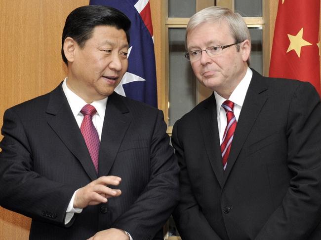 21/06/2010 WIRE: China's Vice President Xi Jinping talks with Australia's Prime Minister Kevin Rudd during the signing ceremony at the Parliament House in Canberra, Australia, Monday, June 21, 2010. Jinping is on a five-day visit here. (AP Photo/Mark Graham)