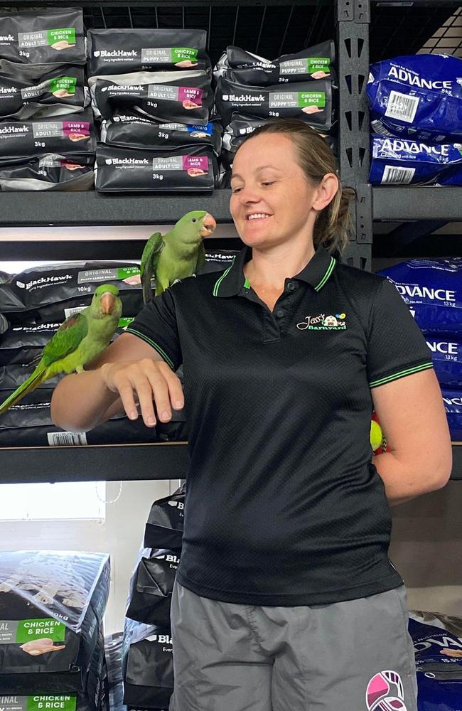 Jess' Barnyard owner Jess Banks with two Alexandrine parrots that were stolen in a shocking theft.