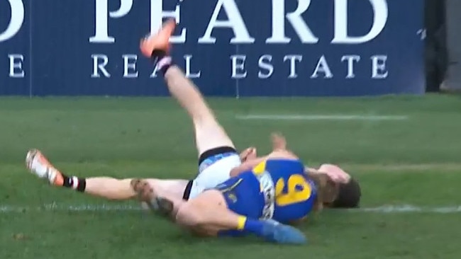 Reid sling tackles Wilson onto the turf.