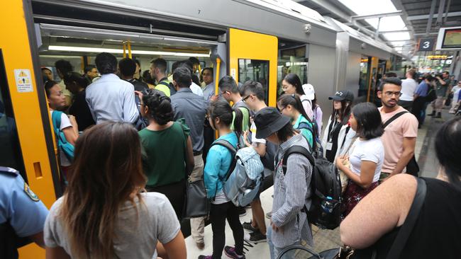 Crowds and police at Parramatta station during the rail industrial action last week. Picture: John Grainger