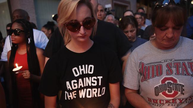 Mourners attend a memorial service for the victims of the Ohio shooting. Picture: AFP