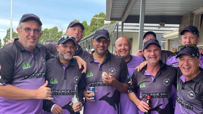 Kangaroos Firsts players take a cool drink after winning the premiership.