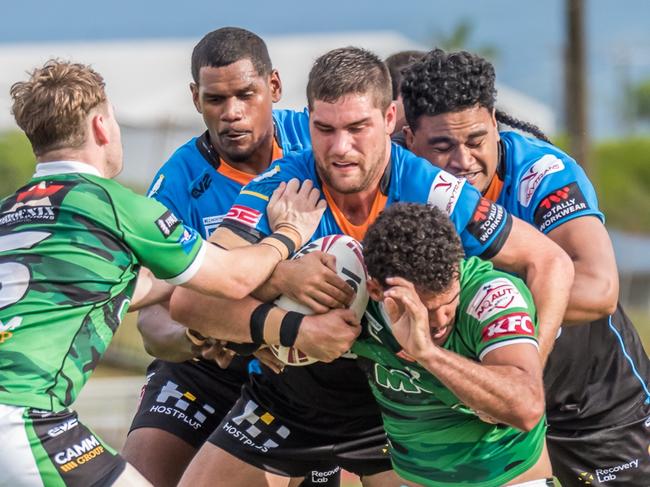 Northern Pride players tackle their Townsville Blackhawks opponent in the Hostplus Cup match at Barlow Park. Picture: CHRIS ROBSON