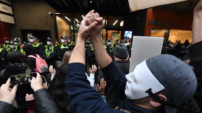 Protesters taunt Victoria Police. Picture: AAP