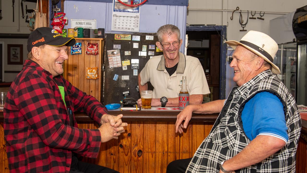 Forest Hill pub barman Skin, (aka John Whitney) was named the best bar tender in the Lockyer Valley and Somerset Region. He is pictured with some of his locals Ash Olm and Peter Schmidt. PHOTO: Ali Kuchel