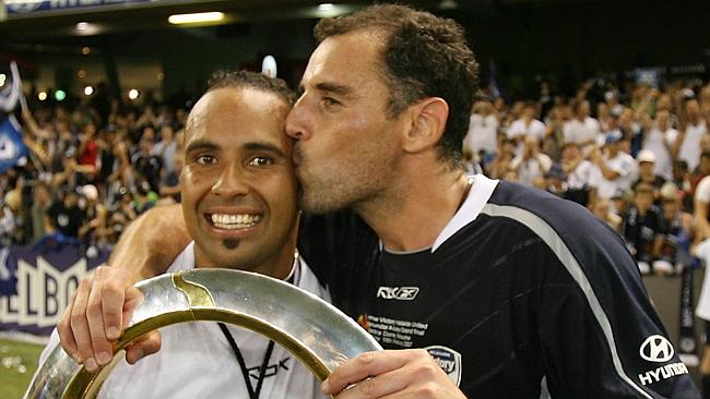 Archie Thompson and now-coach Kevin Muscat celebrate Victory’s grand final win in 2007.