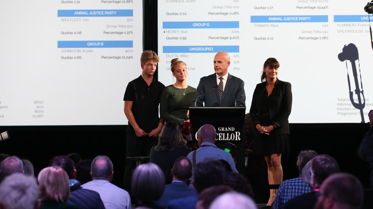 Premier Peter Gutwein arrives inside the tally room alongside wife Amanda and children Finn and Millie as he celebrates the Liberal party's win during the Tasmania state election 2021. Picture: Zak simmonds