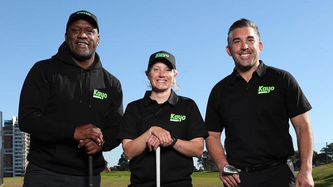 Wendell Sailor, Alyssa Healy and Braith Anasta lined up in a Kayo golf challenge at Moore Park Driving Range. Picture: Brett Costello