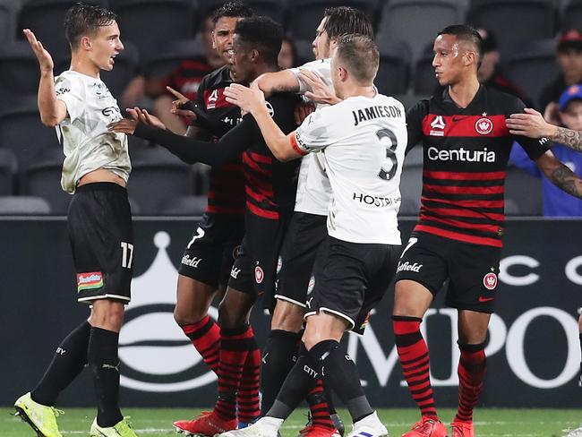 Wanderers players confront Denis Genreau.