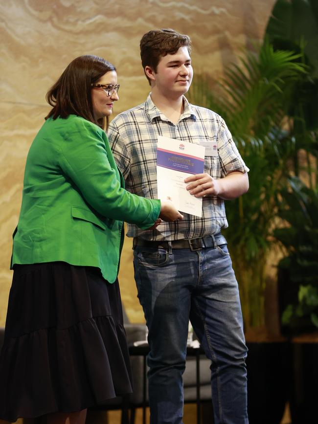 Another course winners receives his award. Picture: Tim Hunter.