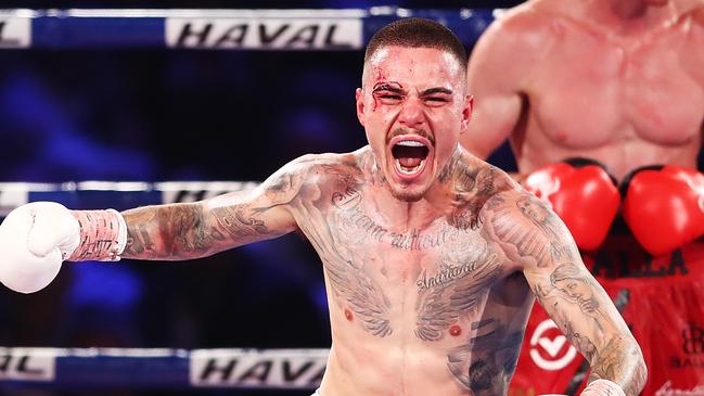 George Kambosos Jr celebrates winning a war against Qamil Balla. Picture: Hannah Peters/Getty