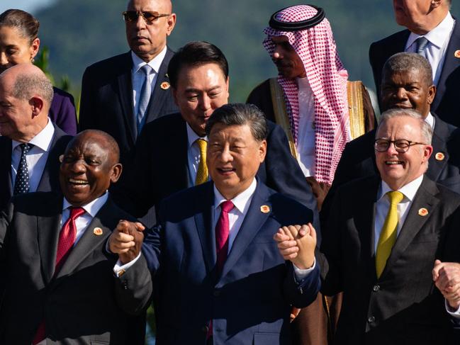 (L-R, front row) South African Cyril Ramaphosa, President Chinese President Xi Jinping and Australian Prime Minister Anthony Alabanese stand during a group photo with G20 leaders in Brazil. Picture: AFP