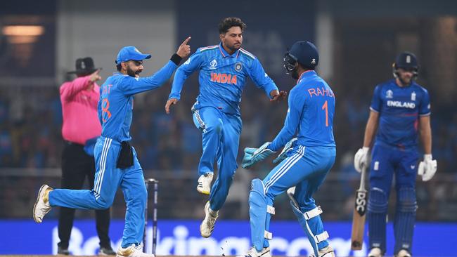 Kuldeep Yadav of India celebrates the wicket of Liam Livingstone. Photo by Gareth Copley/Getty Images.