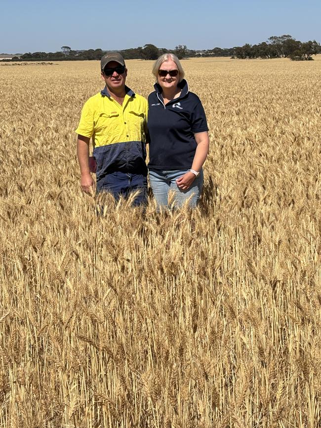 Bruce and Heather Talbot in a crop of wheat on their Western Australian property. Picture: Supplied