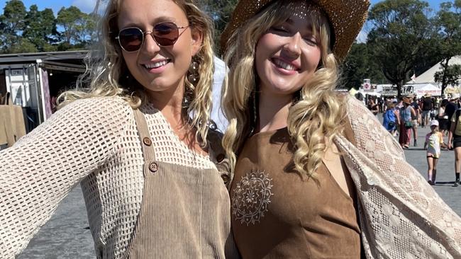 Brit Gillespie, 27, from Newcastle and Emi Aiken, 23, from Lennox head at Byron Bay's Bluesfest festival, March 30 2024. Picture: Savannah Pocock