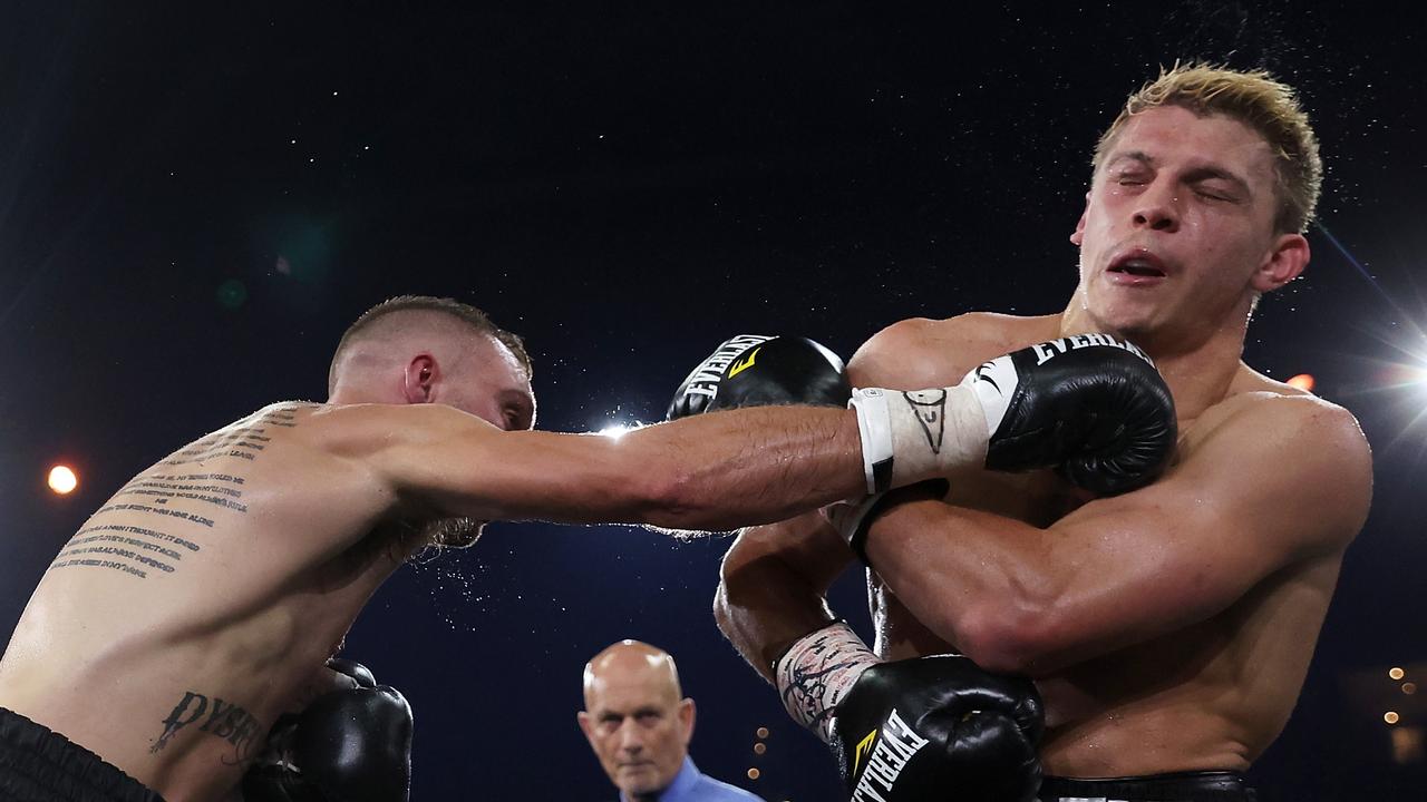 Bo Belbin connects with Nikita Tszyu. (Photo by Mark Kolbe/Getty Images)