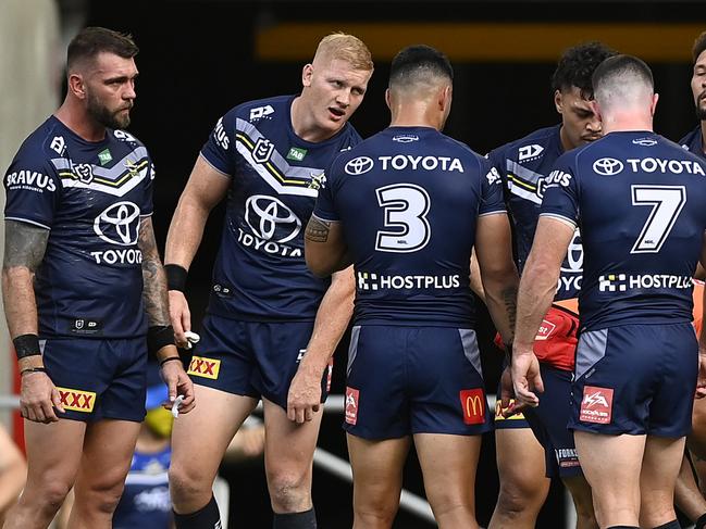 TOWNSVILLE, AUSTRALIA - MARCH 18: The Cowboys stand together during the round three NRL match between North Queensland Cowboys and New Zealand Warriors at Qld Country Bank Stadium on March 18, 2023 in Townsville, Australia. (Photo by Ian Hitchcock/Getty Images)