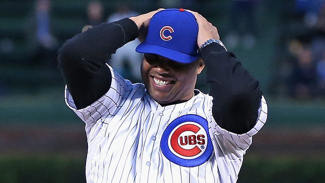 CHICAGO, IL - SEPTEMBER 16: Former NBA star Charles Barkley reacts after throwing a ceremonial first pitch before a game between the Chicago Cubs and the Cincinnati Reds at Wrigley Field on September 16, 2014 in Chicago, Illinois. Jonathan Daniel/Getty Images/AFP == FOR NEWSPAPERS, INTERNET, TELCOS & TELEVISION USE ONLY ==